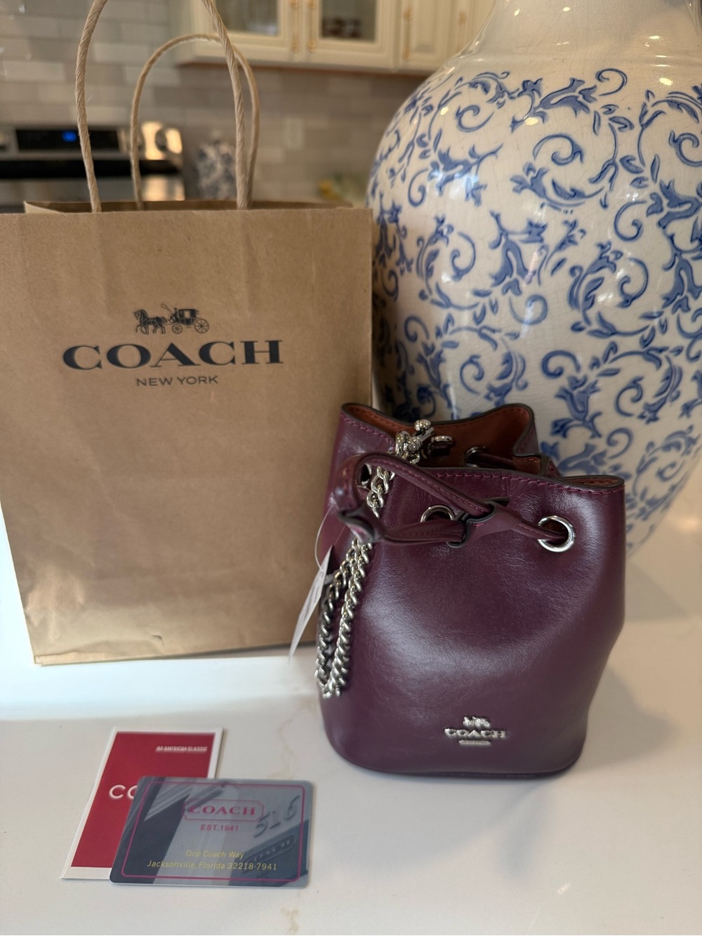 COACH Burgundy Leather Mini Bucket bag with Silver Chain